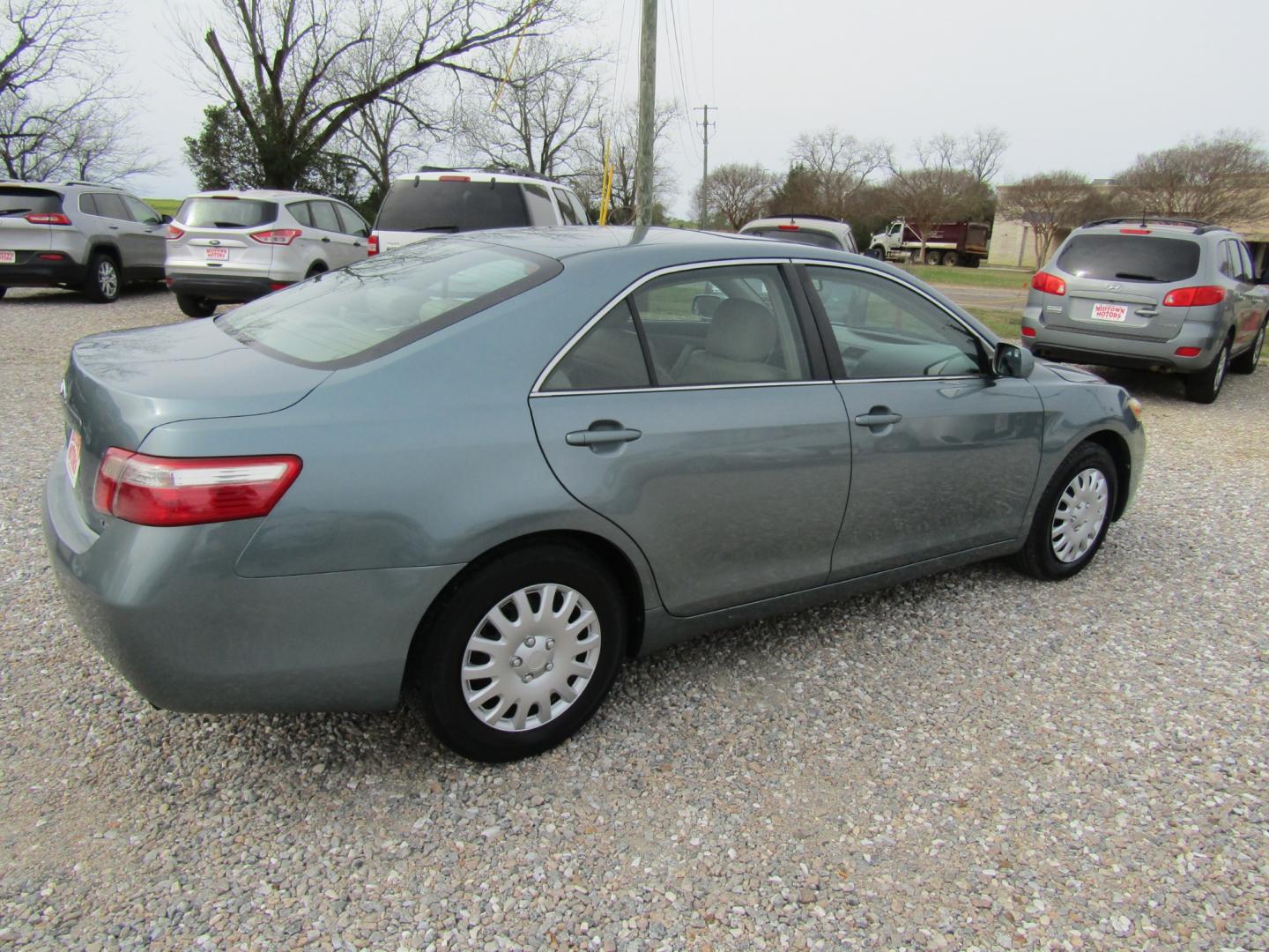 2009 Lt Green /Tan Toyota Camry (4T1BE46K19U) with an 4 Cyl engine, Automatic transmission, located at 15016 S Hwy 231, Midland City, AL, 36350, (334) 983-3001, 31.306210, -85.495277 - Photo#7